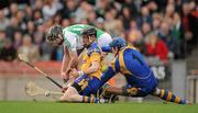 17 March 2010; Patrick Reid, Ballyhale Shamrocks, in action against Eugene McEntee and goalkeeper Ivan Canning, Portumna. AIB GAA Hurling All-Ireland Senior Club Championship Final, Ballyhale Shamrocks v Portumna, Croke Park, Dublin. Picture credit: Brendan Moran / SPORTSFILE