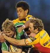 17 March 2010; Fionn Carr, Connacht, is tackled by Toby Faletau and Will Harries Newport Gwent Dragons. Celtic League, Connacht v Newport Gwent Dragons, Sportsground, Galway. Picture credit: Ray Ryan / SPORTSFILE