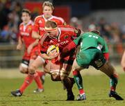 18 March 2010; Mick O'Driscoll, Munster, is tackled by Rhys Priestland, Scarlets. Celtic League, Munster v Scarlets, Musgrave Park, Cork. Picture credit: Matt Browne / SPORTSFILE