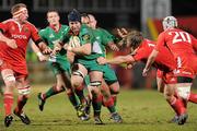 18 March 2010; David Lyons, Scarlets, is tackled by David Ryan, right, and Mick O'Driscoll, Munster. Celtic League, Munster v Scarlets, Musgrave Park, Cork. Picture credit: Matt Browne / SPORTSFILE