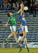 18 March 2010; Bobby O'Brien, Limerick, in action against Alan Moloney, Tipperary. Cadbury Munster GAA Football Under 21 Championship Semi-Final, Tipperary v Limerick, Semple Stadium, Thurles, Co. Tipperary. Picture credit: Diarmuid Greene / SPORTSFILE