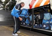 19 March 2010; Dublin football manager Pat Gilroy puts his luggage on the team bus prior to the teams departure, from DCU, ahead of their Allianz National Football League game against Cork on Saturday. Dublin City University, Glasnevin, Dublin. Picture credit: Pat Murphy / SPORTSFILE