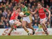 21 March 2010; Aidan O'Mahony, Kerry, in action against Trevor Howley, left, and Keith Higgins, Mayo. Allianz GAA National Football League, Division 1, Round 5, Kerry v Mayo, Austin Stack Park, Tralee, Co. Kerry. Picture credit: Stephen McCarthy / SPORTSFILE