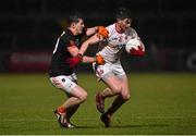 26 March 2016; Richard Donnelly, Tyrone, in action against Joe McElroy, Armagh. Allianz Football League, Division 2, Round 6, Tyrone v Armagh, Healy Park, Omagh, Co. Tyrone. Photo by Sportsfile