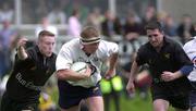 19 May 2001; Mick O'Driscoll of Cork Constitution evades the tackled of Mike Prendergast of Young Munster during the AIB All-Ireland League Division 1 Semi-Final match between Cork Constitution RFC and Young Munster RFC at Temple Hill in Cork. Photo by Matt Browne/Sportsfile