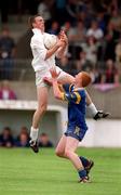 19 May 2001; Donal Moloney of Kildare in action against Eoin Burke of Wicklow during the Leinster Minor Football Championship match between Kildare and Wicklow at St Conleth's Park in Newbridge, Kildare. Photo by Matt Browne/Sportsfile