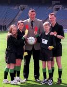 21 May 2001; Pictured at the launch of the Church and General, Cumann na mBunscol Young Whistlers initiative are, Dublin Star Ciaran Whelan, Business Development Executive, Church and General, Referee Eamon Morris, and young whistlers, David Walsh, Leigh-Ann Dillon and Gavin Boland. Photo by Ray McManus/Sportsfile