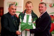 25 May 2001; Dominic O'Rourke, left, President of the Irish Amateur Boxing Association, and welterweight boxer James Moore, centre are presented with official gear by Cormac Farrell, O'Neills Irish International during the Dublin Launch of the World Amateur Boxing Championships 2001 at the National Boxing Stadium in Dublin. The matched will be held in Belfast from the 3rd to the 10th June. Photo by Brendan Moran/Sportsfile