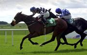 26 May 2001; Mist of Magic, with Pat Smullen up, on their way  to winning the Bad Lippspringe Handicap of £12,500, from number 9, Berkley Bay, with Tadgh O'Shea up, at The Curragh Racecourse in Kildare. Photo by Damien Eagers/Sportsfile