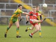 3 April 2010; Emmet McGuckian, Derry, in action against Danny Curran, Donegal. Cadbury Ulster GAA Football Under 21 Championship Semi-Final, Derry v Donegal, Brewster Park, Enniskillen, Co. Fermanagh. Picture credit: Oliver McVeigh / SPORTSFILE