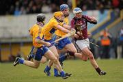 3 April 2010; Brendan Murtagh, Westmeath, races goalwards ahead of Clare defenders Pat Vaughan, Cian Dillon, left, and James McInerney. Allianz GAA Hurling National League Division 2 Round 6, Clare v Westmeath, Cusack Park, Ennis, Co. Clare. Picture credit: Ray McManus / SPORTSFILE