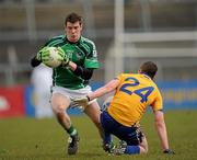 3 April 2010; Ian Ryan, Limerick, in action against Enda Coughlin, Clare. Allianz GAA Football National League Division 4 Round 8, Clare v Limerick, Cusack Park, Ennis, Co. Clare. Picture credit: Ray McManus / SPORTSFILE