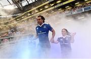 2 April 2016; Leinster match day mascots Jake O'Hara, left, from Skerries, Co. Dublin, and Tara McDermott, from Edenderry, Co.Offaly, lead the team out with captain Isa Nacewa, before the Guinness PRO12 round 19 clash between Leinster and Munster at the Aviva Stadium, Lansdowne Road, Dublin. Picture credit: Ramsey Cardy / SPORTSFILE