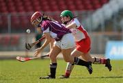 11 April 2010; Denise McGrath, Westmeath, in action against Siobhan Hughes, Tyrone. Camogie National League Division 4 Final, Tyrone v Westmeath, Healy Park, Omagh, Co. Tyrone. Picture credit: Ray McManus / SPORTSFILE