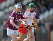 11 April 2010; Aoife Hughes, Westmeath, in action against Aisling Conaty, Tyrone. Camogie National League Division 4 Final, Tyrone v Westmeath, Healy Park, Omagh, Co. Tyrone. Picture credit: Ray McManus / SPORTSFILE