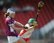 11 April 2010; Aoife Hughes, Westmeath, in action against Aisling Conaty, Tyrone. Camogie National League Division 4 Final, Tyrone v Westmeath, Healy Park, Omagh, Co. Tyrone. Picture credit: Ray McManus / SPORTSFILE