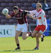 11 April 2010; Eoin Concannon, Galway, in action against Brian Og McAary, Derry. Allianz GAA Football National League Division 1 Round 7, Galway v Derry, Pearse Stadium, Galway. Picture credit: Ray Ryan / SPORTSFILE