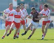 11 April 2010; Niall Coleman, Galway, in action against Patsy Bradley and Charlie Kielt, Derry. Allianz GAA Football National League Division 1 Round 7, Galway v Derry, Pearse Stadium, Galway. Picture credit: Ray Ryan / SPORTSFILE