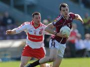 11 April 2010; Conor Healy, Galway, in action against Barry McGuigan, Derry. Allianz GAA Football National League Division 1 Round 7, Galway v Derry, Pearse Stadium, Galway. Picture credit: Ray Ryan / SPORTSFILE