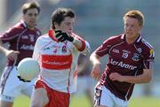 11 April 2010;  Sean Leo McGoldrick, Derry, in action against Tom Fahy, Galway. Allianz GAA Football National League Division 1 Round 7, Galway v Derry, Pearse Stadium, Galway. Picture credit: Ray Ryan / SPORTSFILE