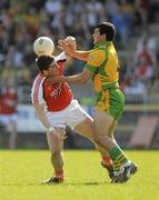 11 April 2010; Brian Mallon, Armagh, in action against Frank McGlynn, Donegal. Allianz GAA Football National League Division 2 Round 7, Donegal v Armagh, O'Donnell Park, Letterkenny, Co. Donegal. Picture credit: Oliver McVeigh / SPORTSFILE