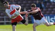 11 April 2010; Mark Lynch, Derry, in action against  Garreth Bradshaw, Galway. Allianz GAA Football National League Division 1 Round 7, Galway v Derry, Pearse Stadium, Galway. Picture credit: Ray Ryan / SPORTSFILE