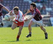 11 April 2010; Raymond Wilkinson, Derry, in action against  Declan Meehan, Galway. Allianz GAA Football National League Division 1 Round 7, Galway v Derry, Pearse Stadium, Galway. Picture credit: Ray Ryan / SPORTSFILE