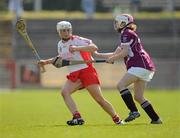 11 April 2010; Grainne O'Neill, Tyrone, in action against Lorraine Leavy, Westmeath. Camogie National League Division 4 Final, Tyrone v Westmeath, Healy Park, Omagh, Co. Tyrone. Picture credit: Ray McManus / SPORTSFILE