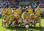 11 April 2010; The Donegal team burst up from the team picture. Allianz GAA Football National League Division 2 Round 7, Donegal v Armagh, O'Donnell Park, Letterkenny, Co. Donegal. Picture credit: Oliver McVeigh / SPORTSFILE