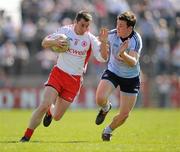 11 April 2010; Brian McGuigan, Tyrone, in action against Niall Corkery, Dublin. Allianz GAA Football National League Division 1 Round 7, Tyrone v Dublin, Healy Park, Omagh, Co. Tyrone. Picture credit: Ray McManus / SPORTSFILE