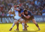 16 April 2010; Ian Gough, Ospreys, is tackled by Jamie Heaslip and Cian Healy, Leinster. Celtic League, Leinster v Ospreys, RDS, Ballsbridge. Picture credit: Matt Browne / SPORTSFILE