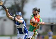 18 April 2010; Des Shaw, Carlow, in action against Willie Hyland, Laois. Allianz GAA Hurling National League, Division 2, Round 7, Carlow v Laois, Dr Cullen Park, Carlow. Picture credit: Brian Lawless / SPORTSFILE