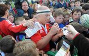 18 April 2010; A bloodied Peter Stringer, Munster, signs autographs for fans. Celtic League, Connacht v Munster, Sportsground, Galway. Picture credit: Ray Ryan / SPORTSFILE