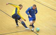 19 April 2010; Patrick Carey, IT Carlow, in action against Craig McDonald, DIT. National Colleges and Universities Futsal Cup Final, IT Carlow v DIT, University of Limerick, Limerick. Picture credit: Diarmuid Greene / SPORTSFILE