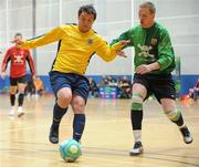 19 April 2010; Eoin Kavanagh, DIT, in action against Kieran McHenry, UCC. National Colleges and Universities Futsal Cup Semi-Final 1, DIT v UCC, University of Limerick, Limerick. Picture credit: Diarmuid Greene / SPORTSFILE