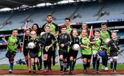 12 April 2016; TV star Moone Boy, David Rawle, joined a host of GAA stars today at Croke Park to launch Kellogg’s GAA Cúl Camps 2016. The summer camps attract over 100,000 children and are hosted in more than 1,000 locations nationwide. Costing just Ä55 for a full week of fun, coaching and a free kit, Kellogg’s is on a mission for the promotion of nutrition coupled with physical activity. Sign up for Kellogg’s GAA Cúl Camps at www.kelloggsculcamps.gaa.ie. Pictured are Cork camogie player Aisling Thompson, Mayo footballer Aidan O'Shea, Kilkenny hurler TJ Reid and Armagh ladies footballer Aimee Mackin with children from Gaelscoil Choláiste Mhuire. Croke Park, Dublin. Picture credit: Ramsey Cardy / SPORTSFILE