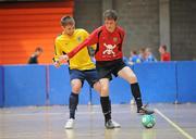 19 April 2010; Rufus Holmes, UCC, in action against Craig McDonald, DIT. National Colleges and Universities Futsal Cup Semi-Final 1, DIT v UCC, University of Limerick, Limerick. Picture credit: Diarmuid Greene / SPORTSFILE