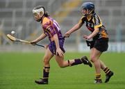 24 April 2010; Kate Kelly, Wexford, in action against Ann Dalton, Kilkenny. Division 1 Camogie National League Final, Offaly v Wexford, Semple Stadium, Thurles, Co. Tipperary. Picture credit: Brian Lawless / SPORTSFILE