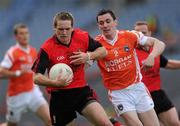 25 April 2010; Peter Fitzpatrick, Down, in action against Andy Mallon, Armagh. Allianz GAA Football National League Division 2 Final, Down v Armagh, Croke Park, Dublin. Picture credit: Pat Murphy / SPORTSFILE