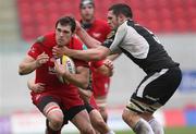 25 April 2010; Sean Lamont, Scarlets, is tackled by Dave Nolan, Connacht. Celtic League, Scarlets v Connacht, Parc y Scarlets, Llanelli, Wales. Picture credit: Steve Pope / SPORTSFILE