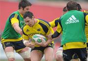 28 April 2010; Munster's David Wallace in action against team-mates Billy Holland and Denis Fogarty during squad training ahead of their Heineken Cup Semi-Final against Biarritz Olympique on Sunday. Musgrave Park, Cork. Picture credit: Matt Browne / SPORTSFILE