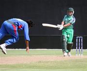 28 April 2010; Ireland's Andre Botha is struck on the leg by an Afghanistan delivery. 2010 Twenty20 Cricket World Cup Warm Up, Ireland v Afghanistan, Providence, Guayana. Picture credit: Handout / Barry Chambers / RSA / Cricket Ireland Via SPORTSFILE