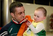 18 April 2016; Team Ireland's David Joyce who won a Bronze medal at the European Olympic Boxing Qualifiers in Samsun, Turkey, with his one year old daughter Amber on his return home. Dublin Airport, Dublin. Picture credit: Cody Glenn / SPORTSFILE