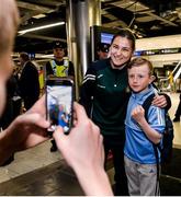 18 April 2016; Team Ireland's Katie Talyor who won a Bronze medal at the European Olympic Boxing Qualifiers in Samsun, Turkey, poses for a photo with Shea Skillen, age 9, from Belfast,  on her return home. Dublin Airport, Dublin. Picture credit: Cody Glenn / SPORTSFILE