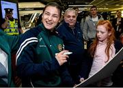 18 April 2016; Team Ireland's Katie Talyor who won a Bronze medal at the European Olympic Boxing Qualifiers in Samsun, Turkey, signs an autograph for Caitlyn Muldoon, age 9, on her return home. Dublin Airport, Dublin. Picture credit: Cody Glenn / SPORTSFILE