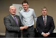 18 April 2016; Philip O'Donnell, DCU, from Donegal, is presented with his Independent.ie Football Rising Stars Award award by Uachtarán Chumann Lúthchleas Gael Aogán Ó Fearghail, left, and Gerry Tully, Chairman of Comhairle Ardoideachais, right. Independent.ie Football Rising Stars Awards. Croke Park, Dublin. Picture credit: Seb Daly / SPORTSFILE