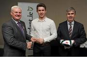 18 April 2016; David Byrne, UCD, from Dublin, is presented with his Independent.ie Football Rising Stars Award award by Uachtarán Chumann Lúthchleas Gael Aogán Ó Fearghail, left, and Gerry Tully, Chairman of Comhairle Ardoideachais, right. Independent.ie Football Rising Stars Awards. Croke Park, Dublin. Picture credit: Seb Daly / SPORTSFILE