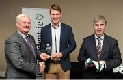 18 April 2016; Liam Casey, UCD, from Tipperary, is presented with his Independent.ie Football Rising Stars Award award by Uachtarán Chumann Lúthchleas Gael Aogán Ó Fearghail, left, and Gerry Tully, Chairman of Comhairle Ardoideachais, right. Independent.ie Football Rising Stars Awards. Croke Park, Dublin. Picture credit: Seb Daly / SPORTSFILE