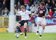 30 April 2010; Tom Miller, Dundalk, in action against Jamie Harris, Drogheda United. Airtricity League Premier Division, Drogheda United v Dundalk, Hunky Dorys Park, Drogheda, Co. Louth. Photo by Sportsfile