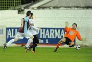 30 April 2010; Ross Gaynor, Dundalk, shoots past Drogheda United goalkeeper Paul Skinner to score his side's third goal. Airtricity League Premier Division, Drogheda United v Dundalk, Hunky Dorys Park, Drogheda, Co. Louth. Photo by Sportsfile